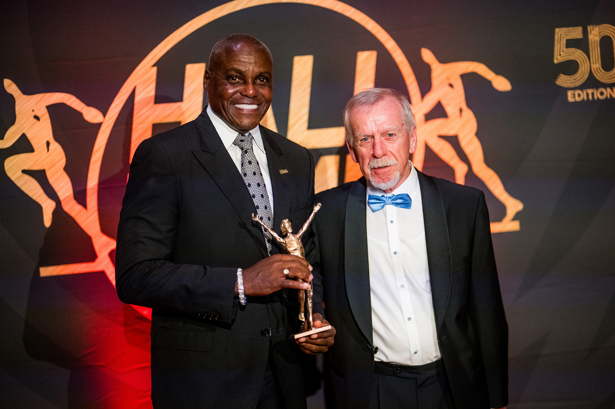 Carl Lewis, Mike Boit en Dwight Stones in Hall of Fame